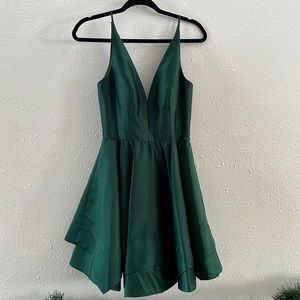 Green formal dress size 1 but I was a 3-4 and for just fine. Has POCKETS!
